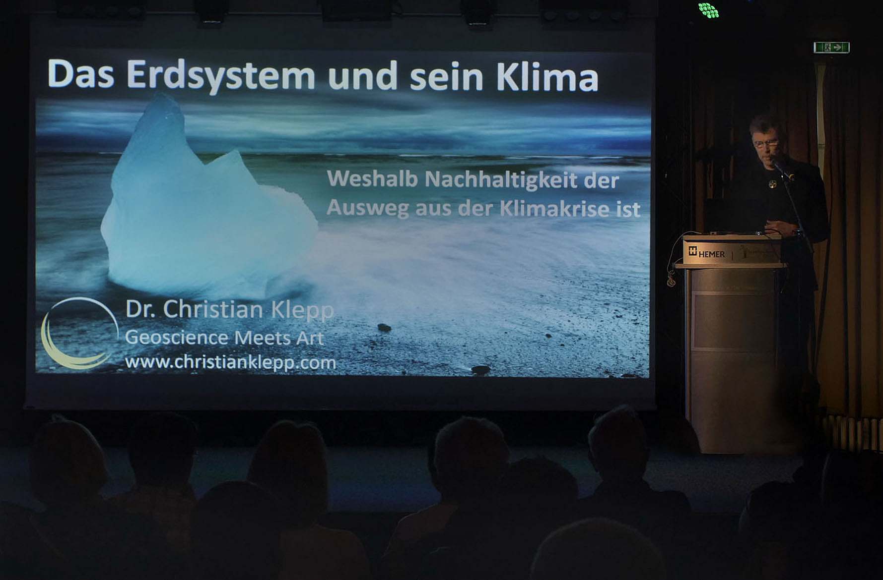 Dr. Christian Klepp giving a lecture on the Earth system, climate change and sustainability