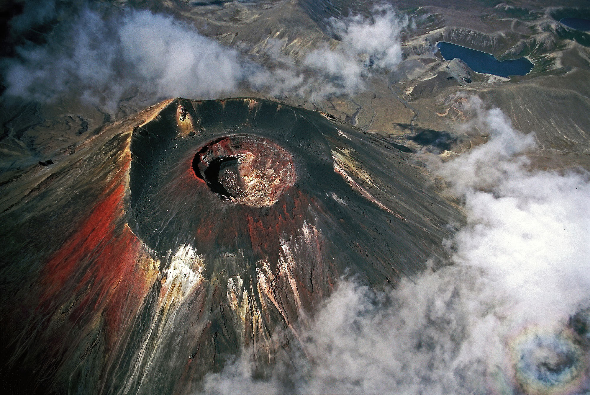 Aerial view of the Mount Ngauruhoe volcanic crater in New Zealand with its colorful lava, ash and pumice.