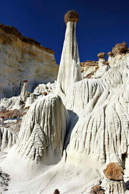 The White Ghosts of the Wahweap Hoodoos in the Escalante Grand Staircase in Utah are towering along the cliffs of the Kaiparowits Plateau