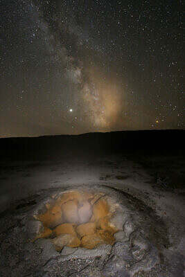 The rising Milky Way above Shell Geyser in the Biscuit Basin of Yellowstone